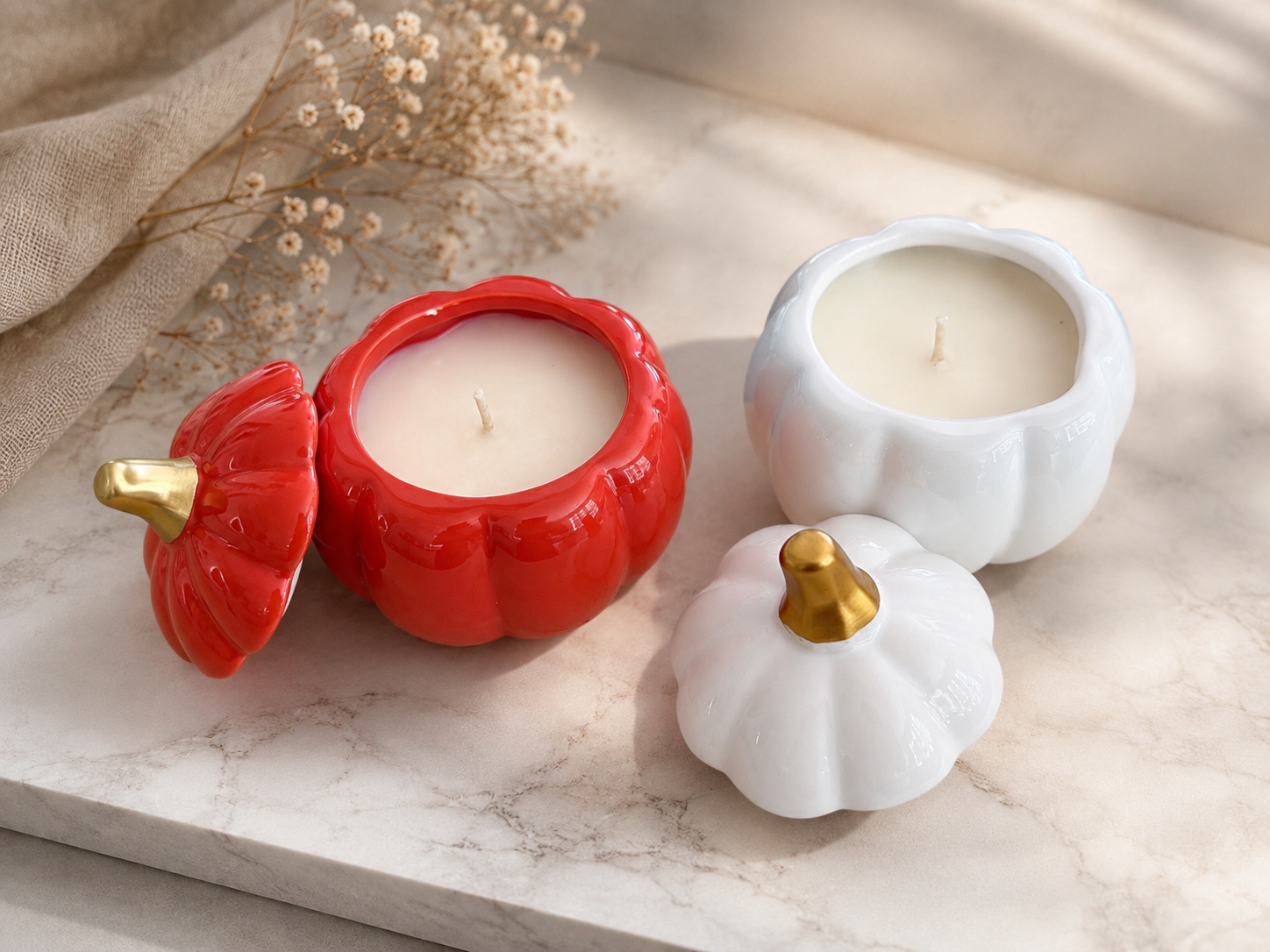 Golden Harvest Pumpkin 8 oz soy candles in orange and white ceramic pumpkin vessels with gold stems, hand-poured in Farmington, Connecticut.