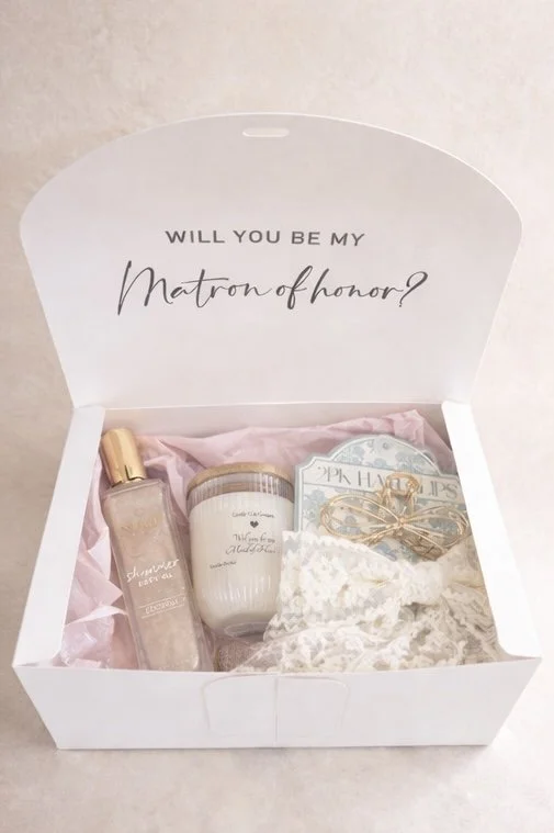 Maid of Honor proposal gift box with candle, matches, body oil, and bridal hair accessory curated by Candle Club Company