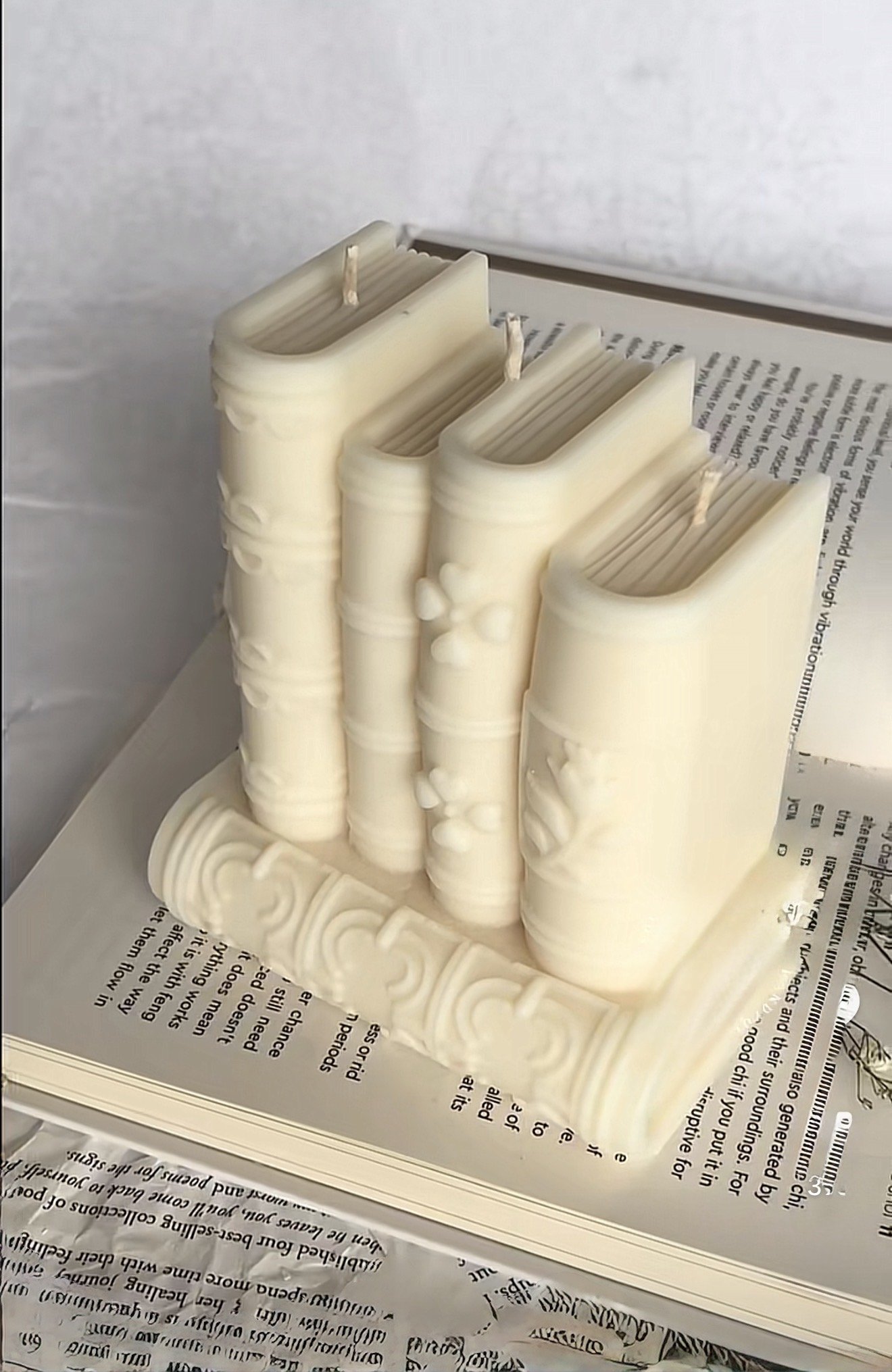Book-inspired sculptural candle with detailed design handmade by Candle Club Company