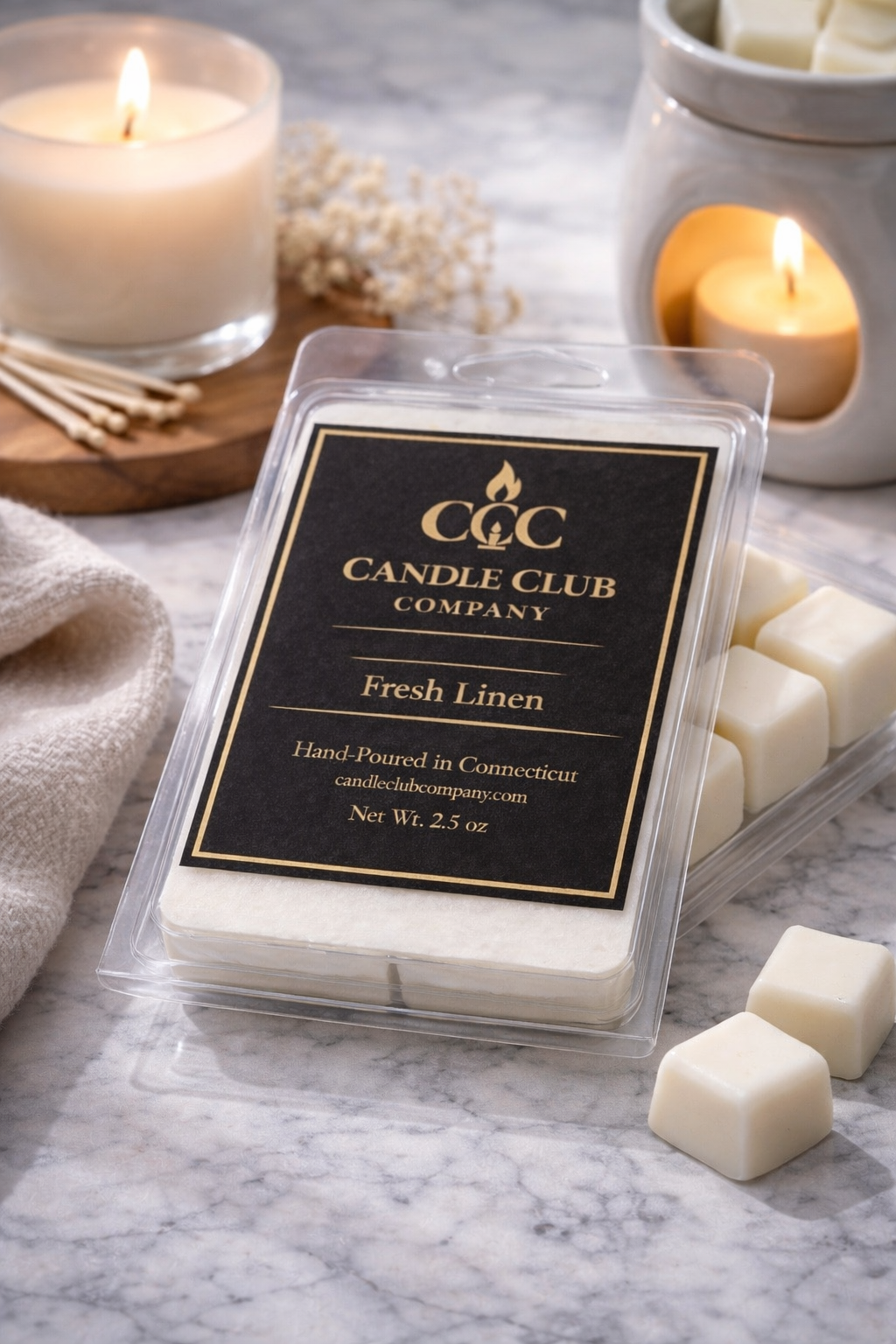 Soy wax melts displayed with lit candles and cozy home decor creating a warm relaxing atmosphere