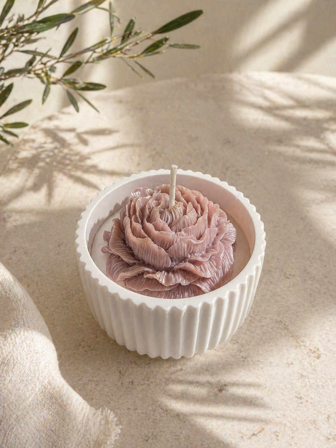 Blush Bloom Luxury Bloom Vessel Candle in white ribbed container with sculpted pink flower top.