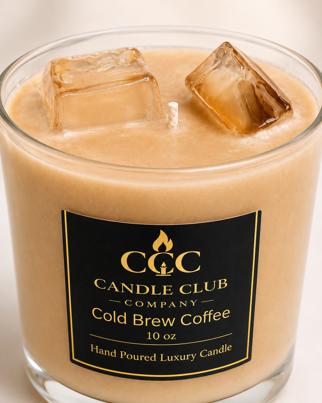 Luxury cold brew coffee candle with realistic jelly ice cubes in a clear glass jar by Candle Club Company