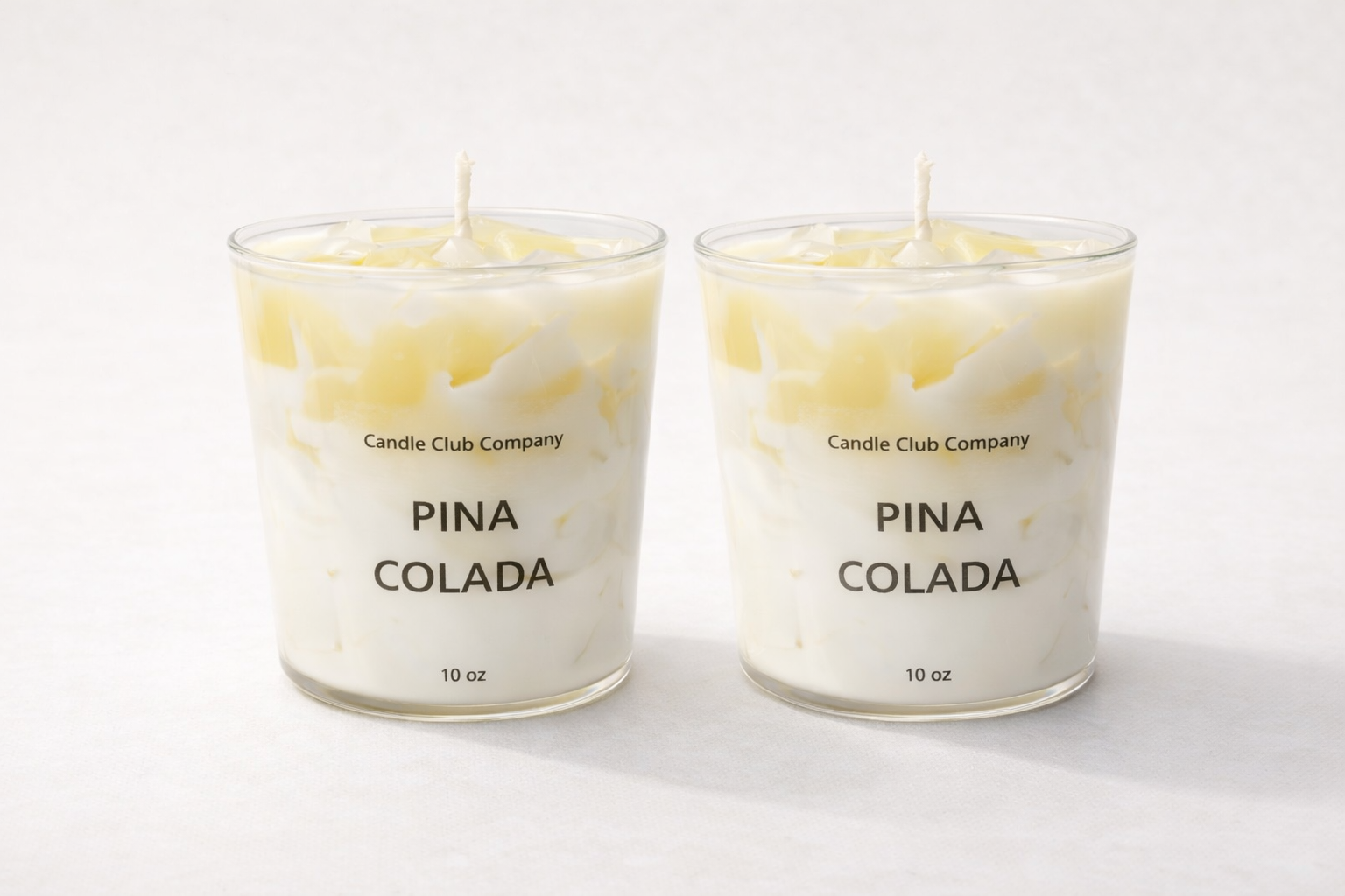 “Piña Colada soy candle with coconut and pineapple scent, handmade in Connecticut by Candle Club Company”