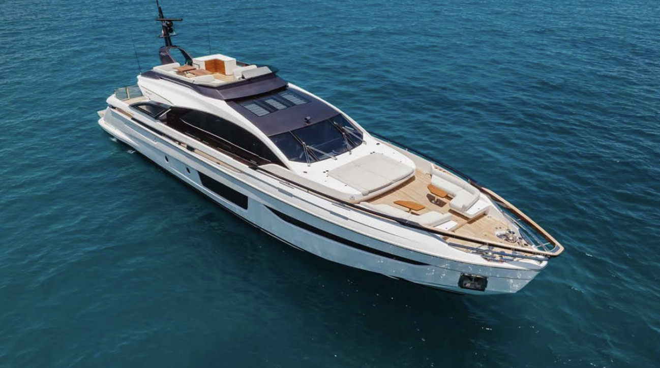 Luxurious yacht sailing on a calm ocean.