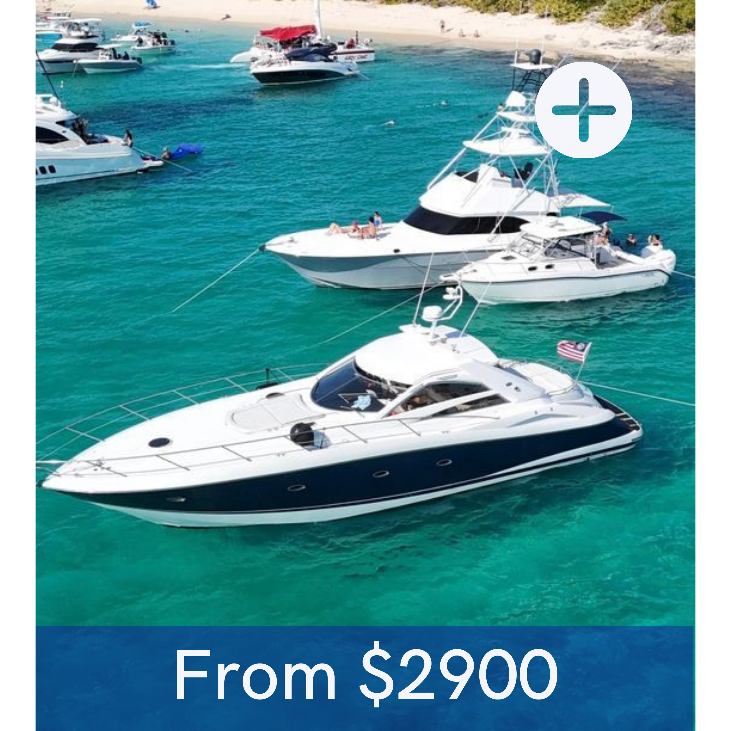 Several luxury yachts and boats anchored in clear turquoise water near a sandy beach with some greenery and a few people on the shore.