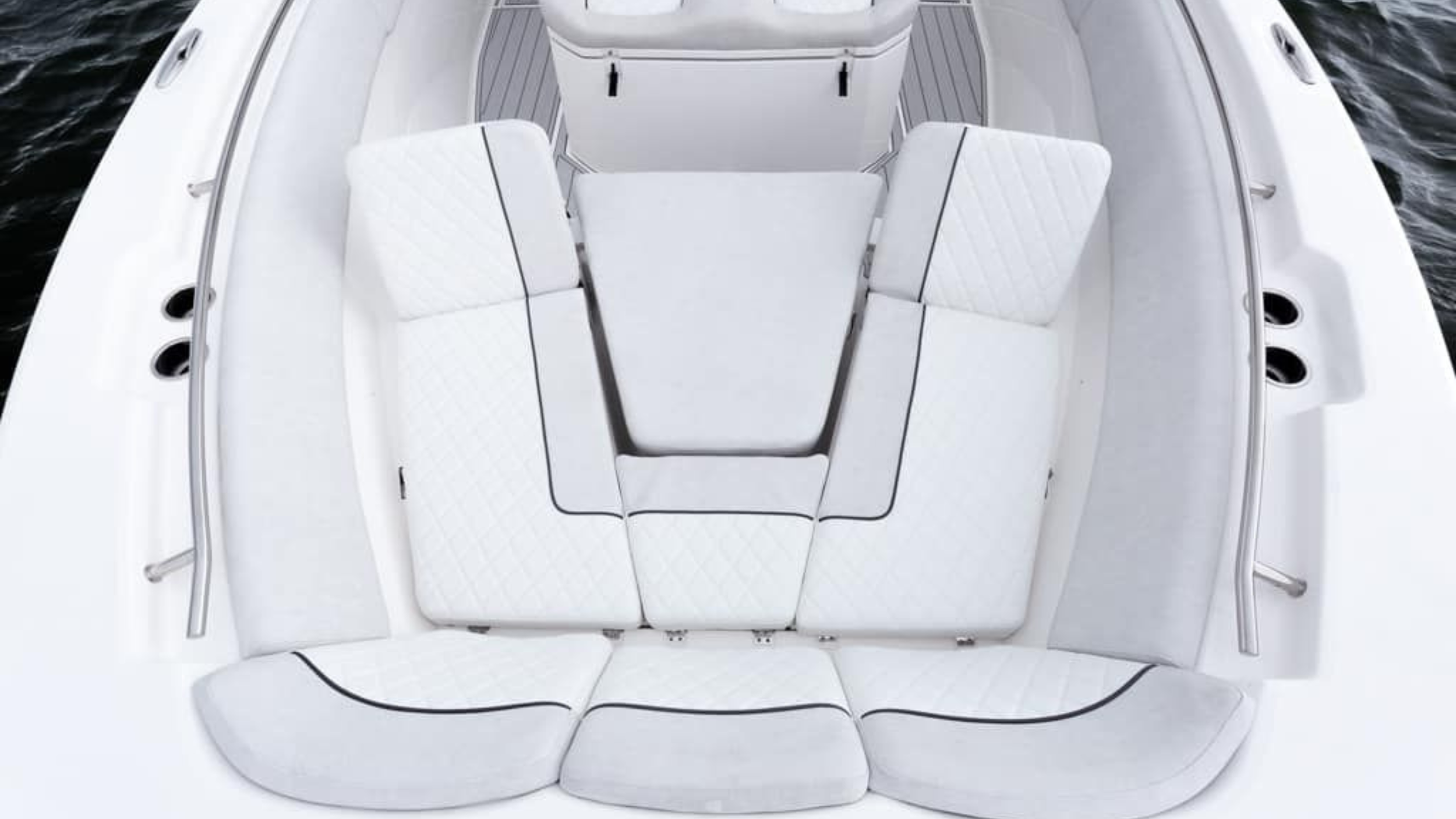 luxury boat seating arrangement with white cushions