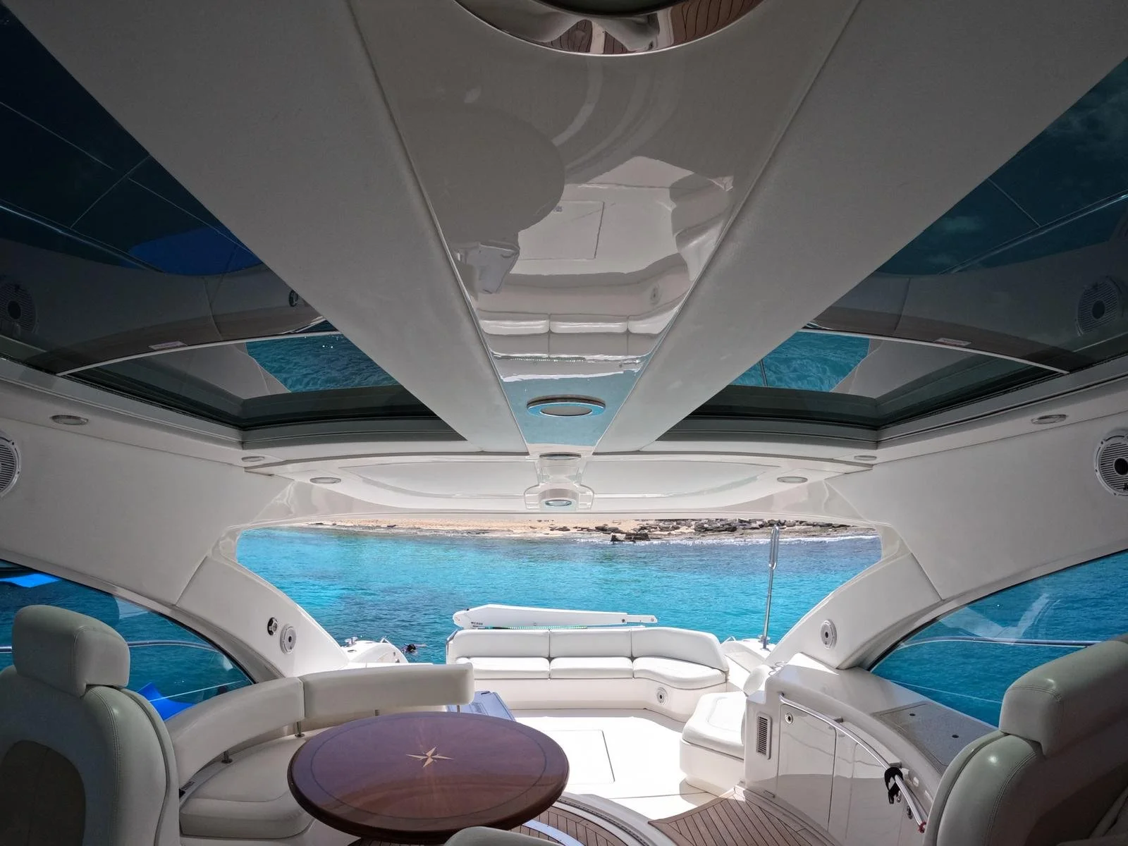 luxury yacht interior with ocean view and seating area