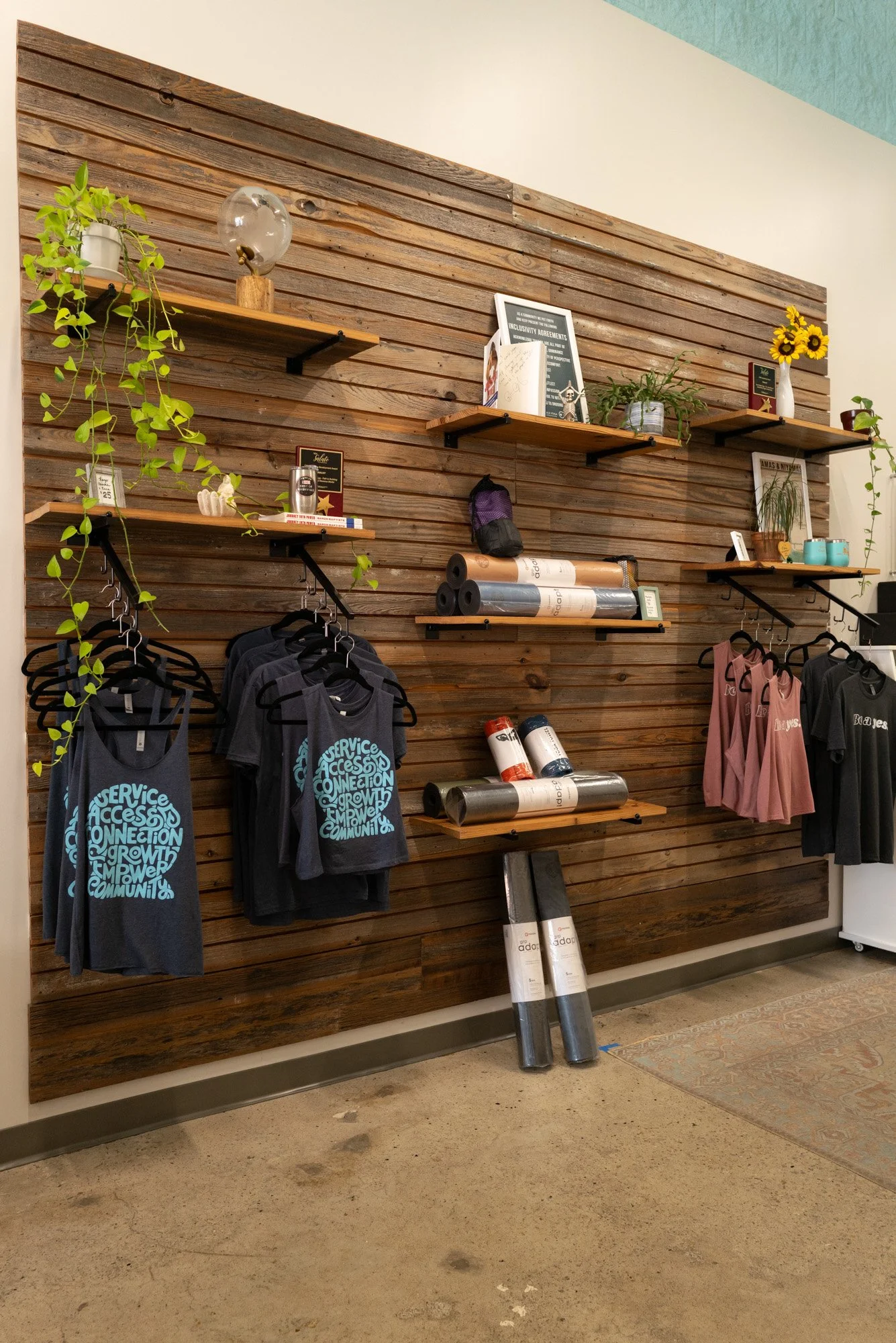 retail space with yoga mats equipment and clothing for sale