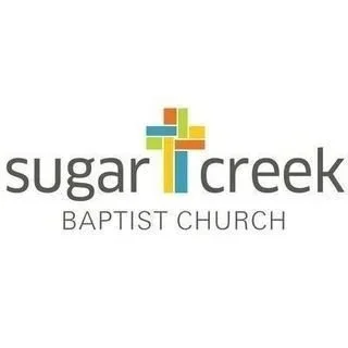 Logo of Sugar Creek Baptist Church with stylized cross and colorful blocks