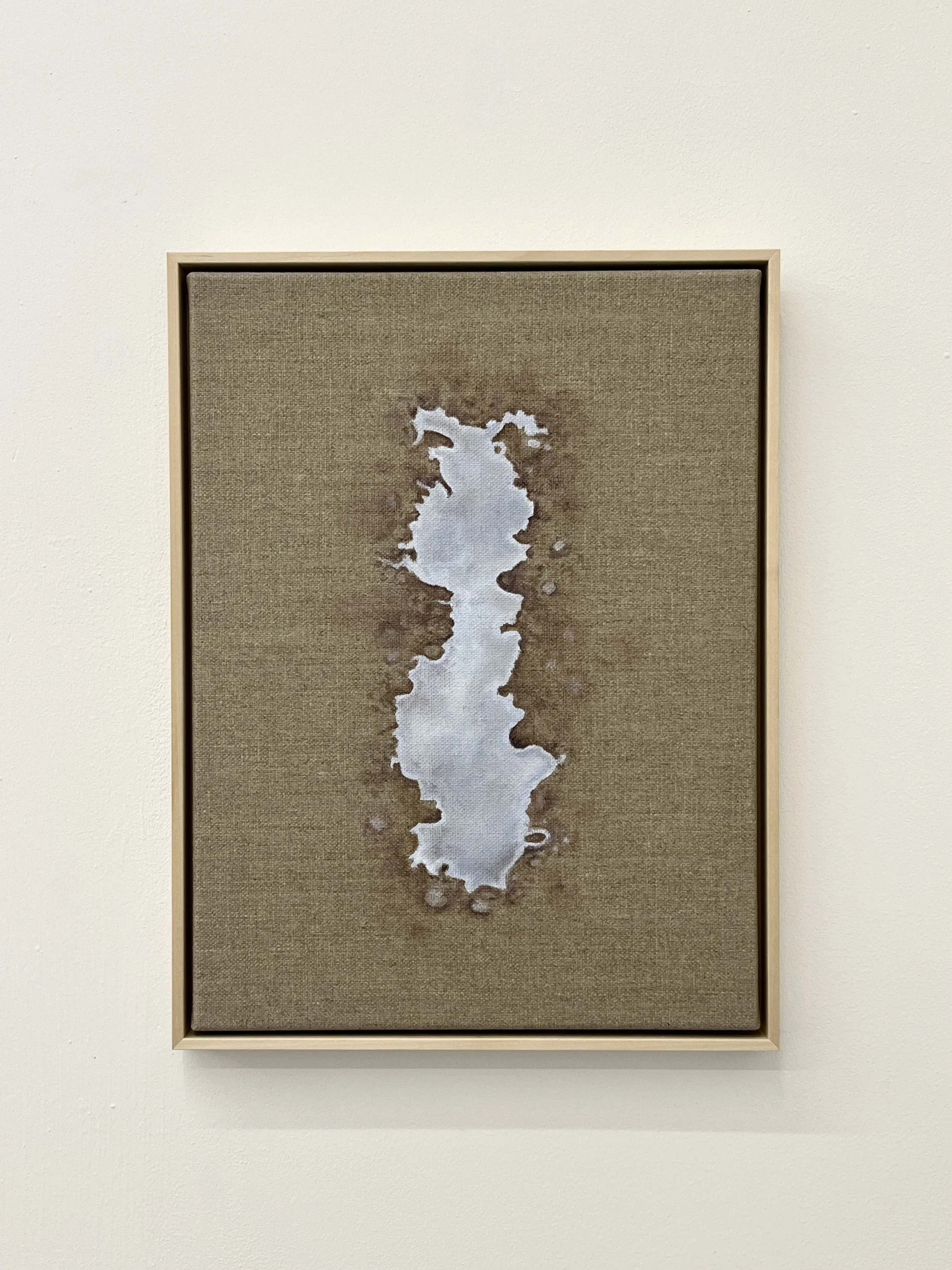 Abstract artwork of a white and gray form on a textured beige background with a simple wooden frame.