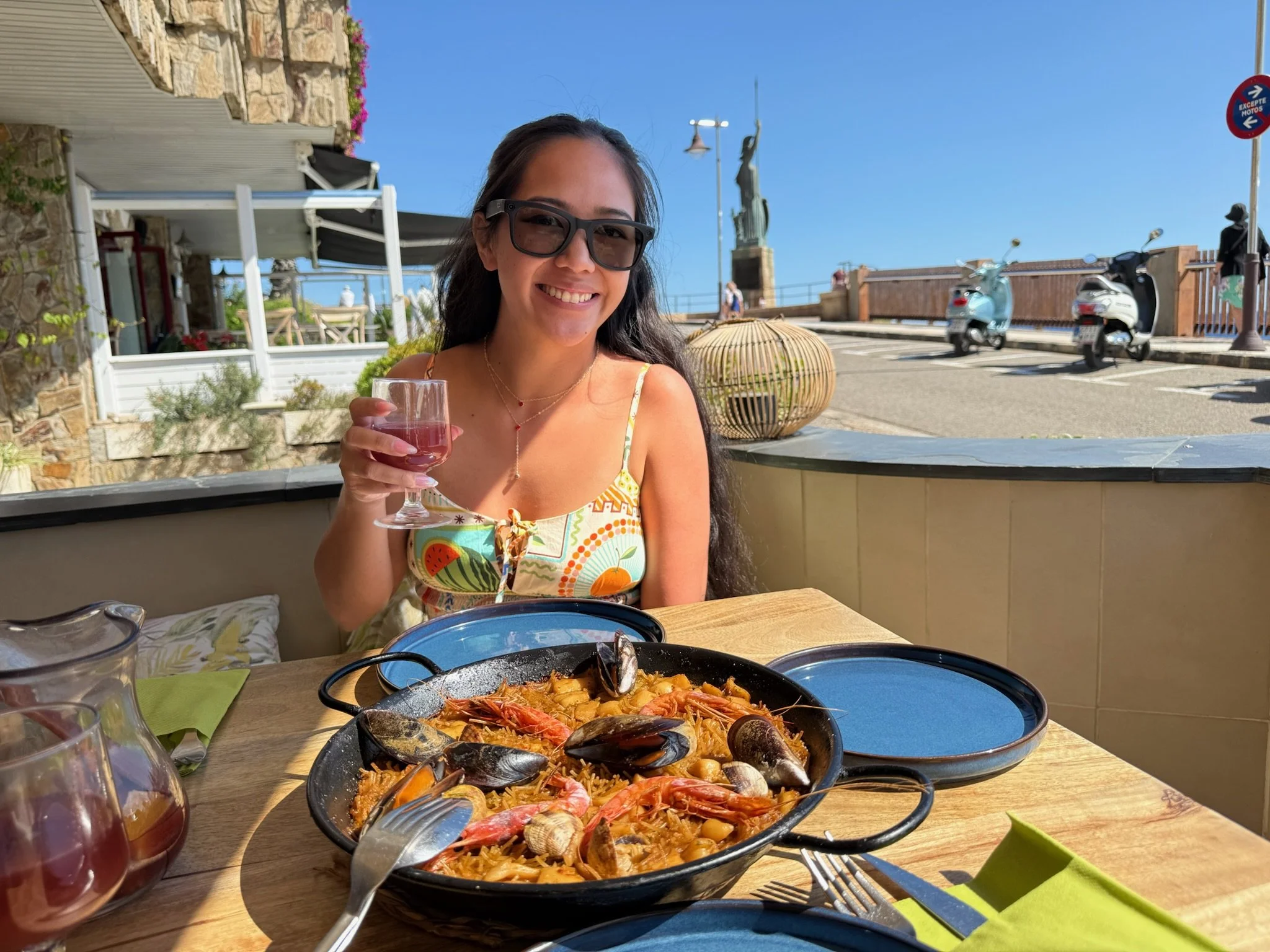 enjoying Fideuà (like paella but with noodles instead of rice)