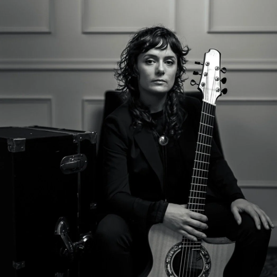 Finger style guitarist, Amber Russell. ROLA Mediaworks client roster.