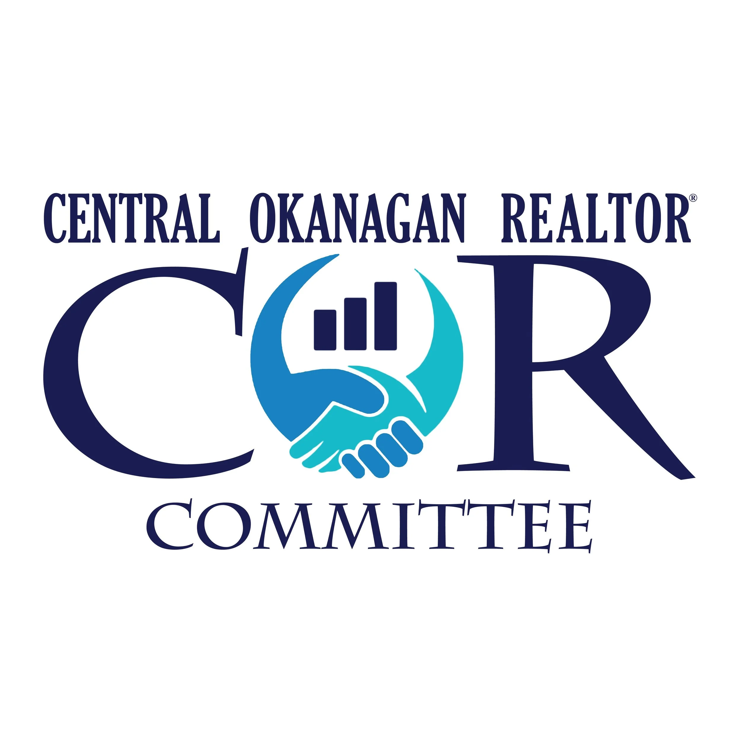 Logo of Central Okanagan Realtor Committee featuring the initials C O R with a handshake and bar chart icon in the center.
