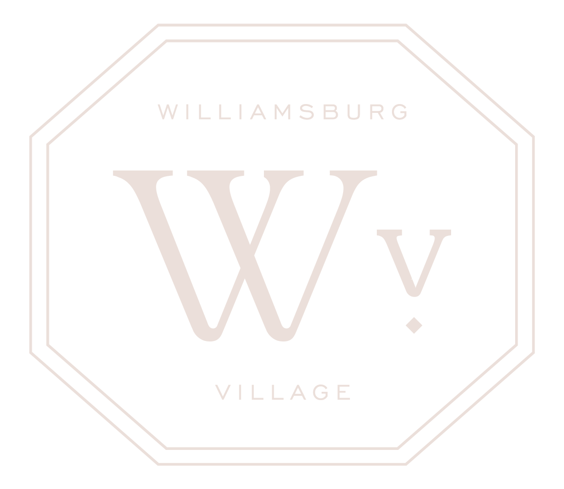 Logo for Williamsburg Village featuring a large letter W and a smaller V inside an octagonal border.