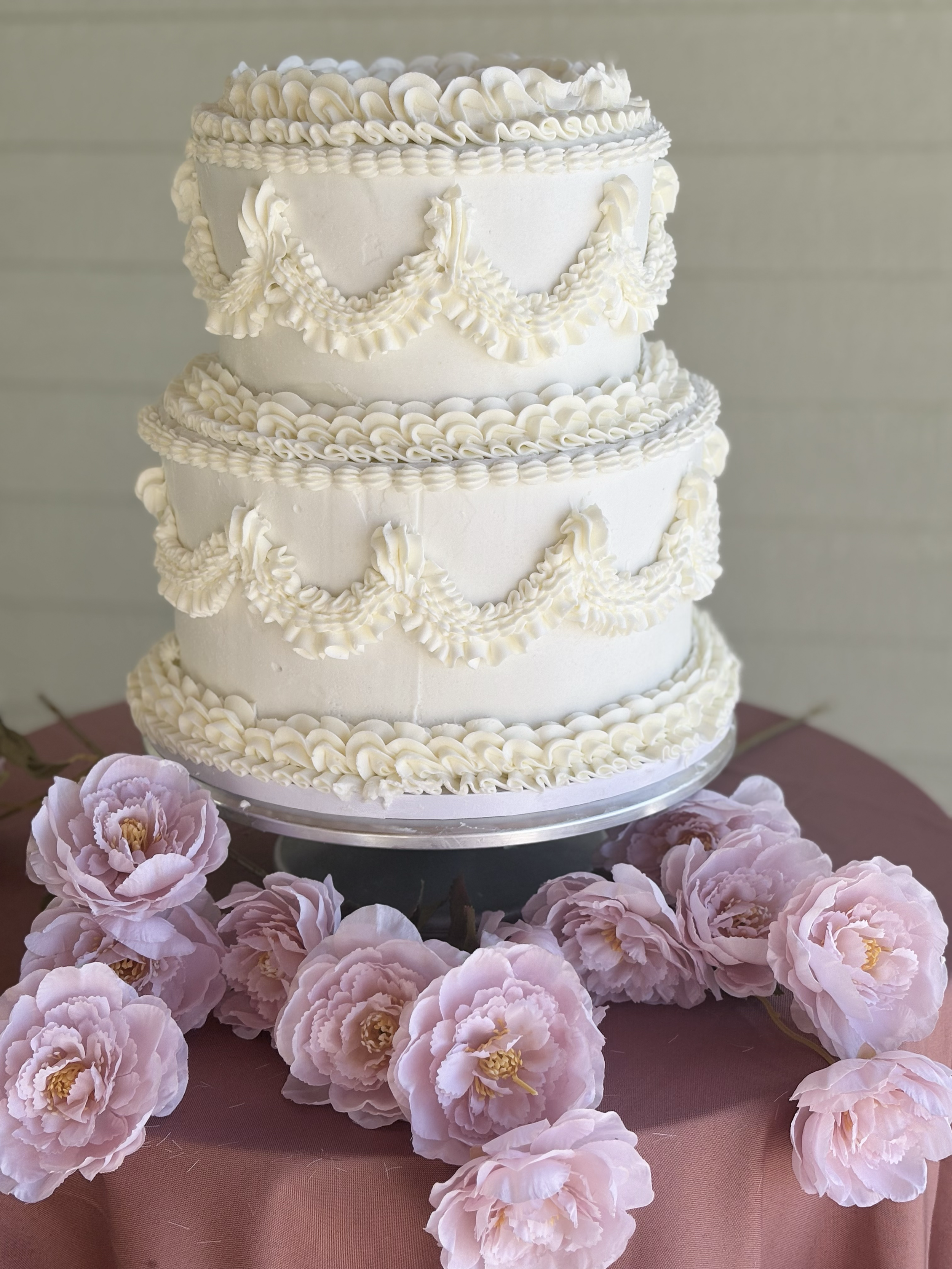 	Double-tiered lemon cake with custom buttercream finish, Joshua Tree bakery