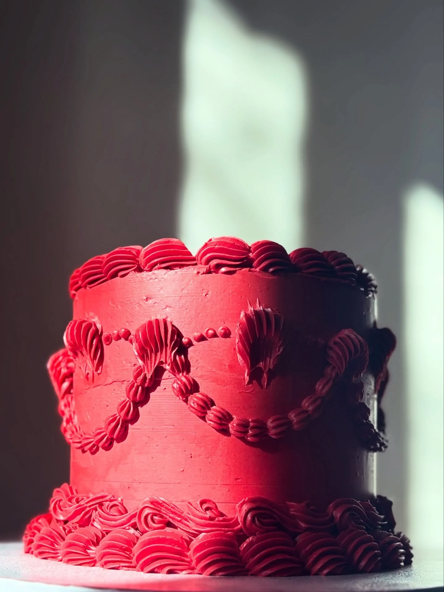 Monochromatic and vintage. Does it even get any more timely than that?
Cake: deep chocolate
Filling: organic strawberry compote
Frosting: vanilla Swiss meringue