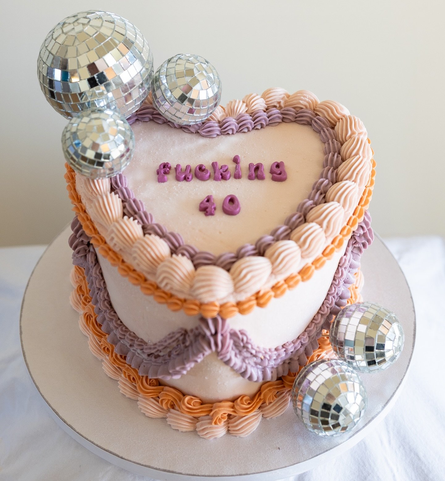 Fucking 40

Cake: gluten-free lemon w/ lavender soak
Filling &amp; frosting: vanilla Swiss meringue 

Served with an extra dose of love and affection for the birthday babe