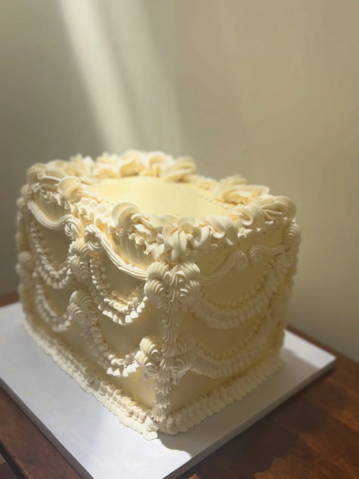 Cookie dough cake dressed up as a Victorian princess. Don&rsquo;t at me, that&rsquo;s just what she is

Don&rsquo;t let the dainty piping fool you, this big girl serves 45 people happily.