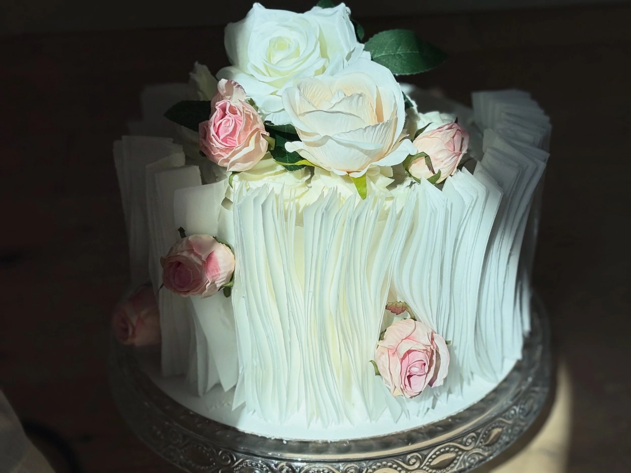 Textures &amp; florals. 

Cake: pistachio filled with alternating layers of white chocolate ganache and raspberry compote. Vanilla bean buttercream