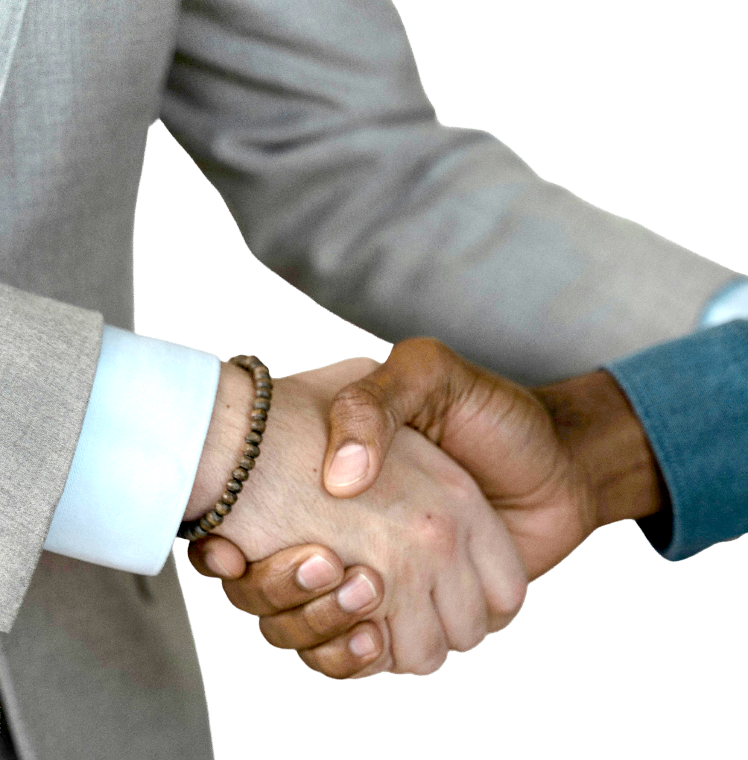 Dos personas estrechándose la mano en señal de saludo o acuerdo.