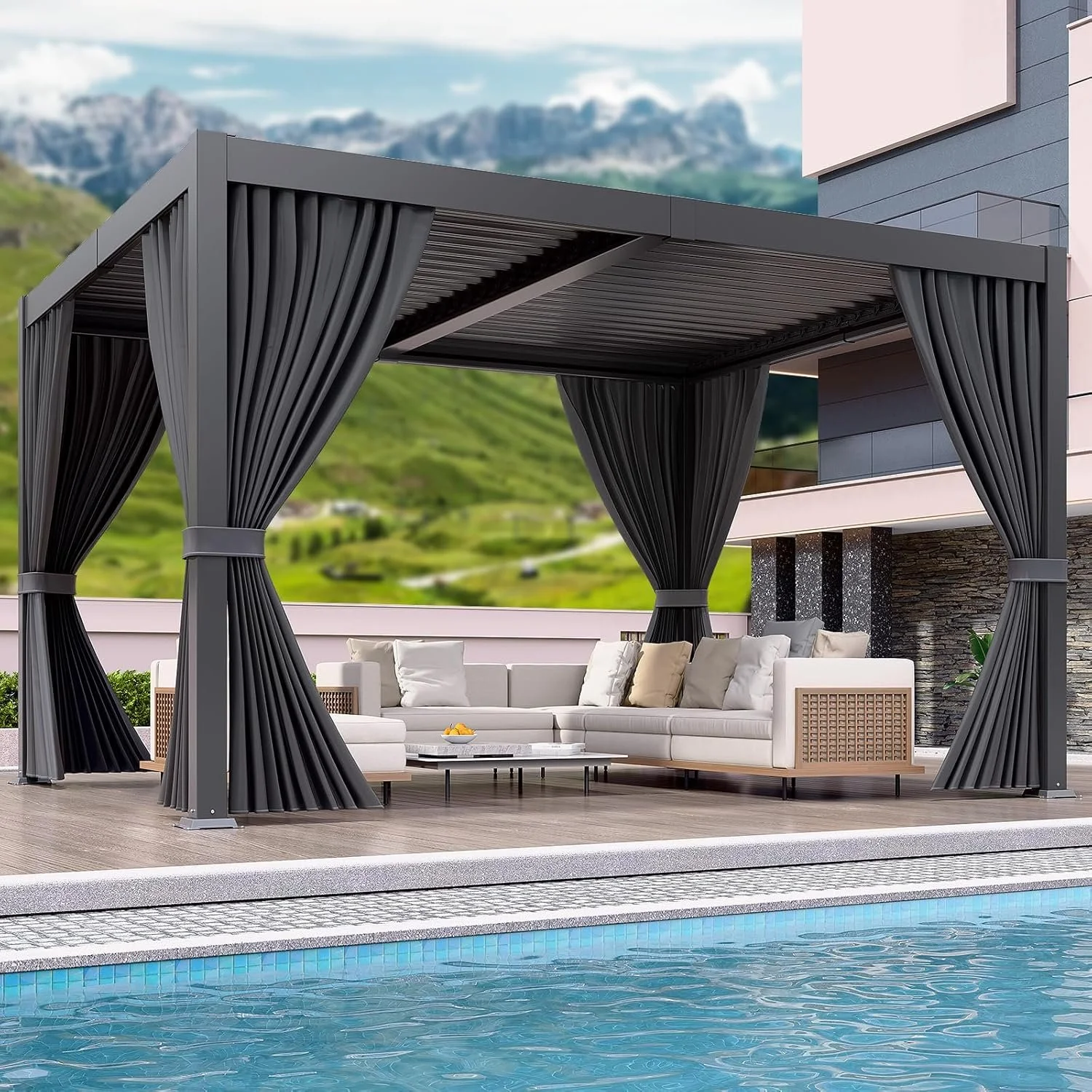 Outdoor patio area with a modern pergola, cushioned seating, and a swimming pool in a scenic mountainous landscape.