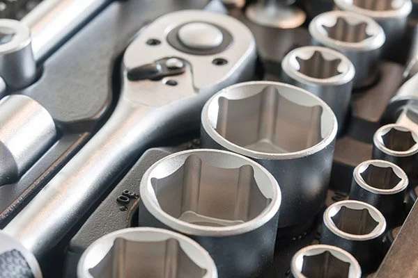 Set of socket wrenches and tools in a toolkit