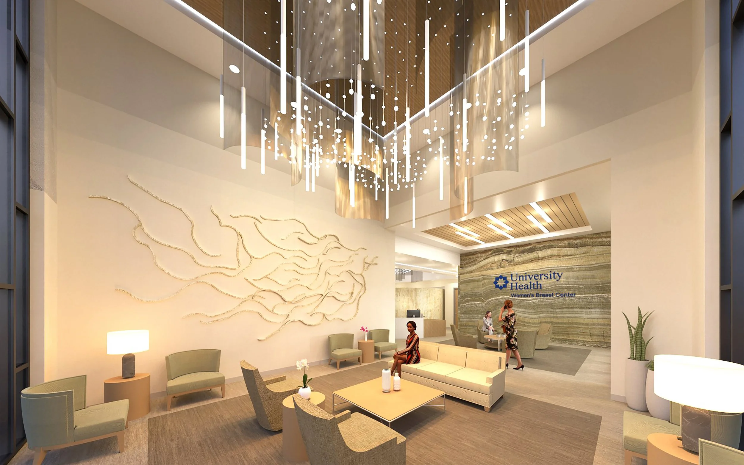 Interior design and architectural design. Healthcare. University Health Breast Center's modern hospital lobby with seating area, abstract wall art, hanging light fixtures, and a sign for University Health Women's Breast Center.