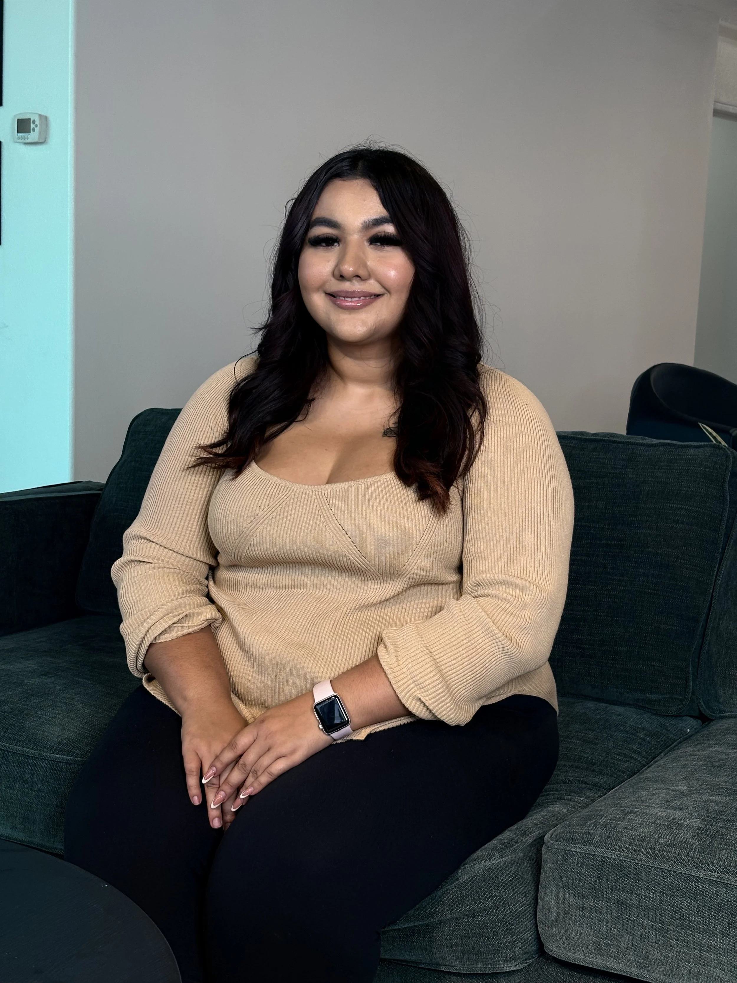 A graphic with a circular brushstroke in shades of beige and brown, containing the text 'Image Coming Soon' in cursive and serif fonts.