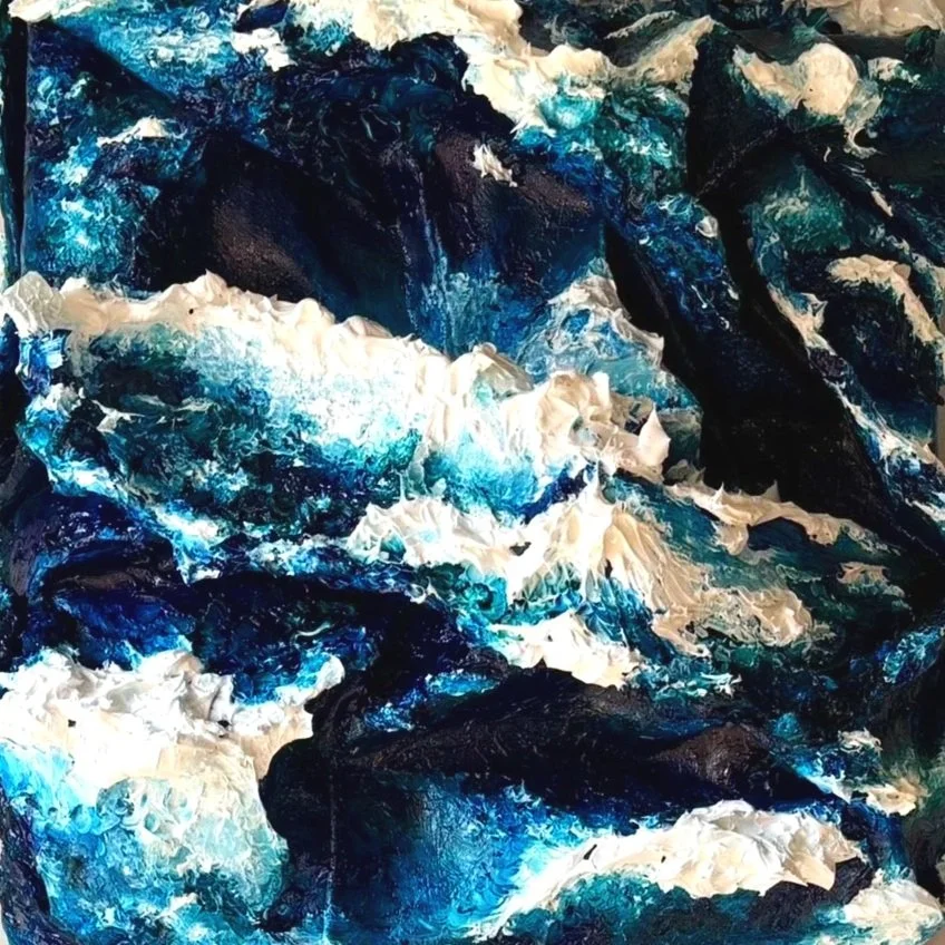 An abstract painting of swirling blue and white colors resembling ocean waves.