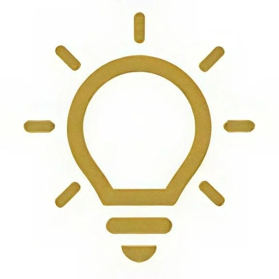 A clock made out of yellowish-brown wooden or plastic materials resembling a lightbulb with rays around it, symbolizing a bright idea or illumination.
