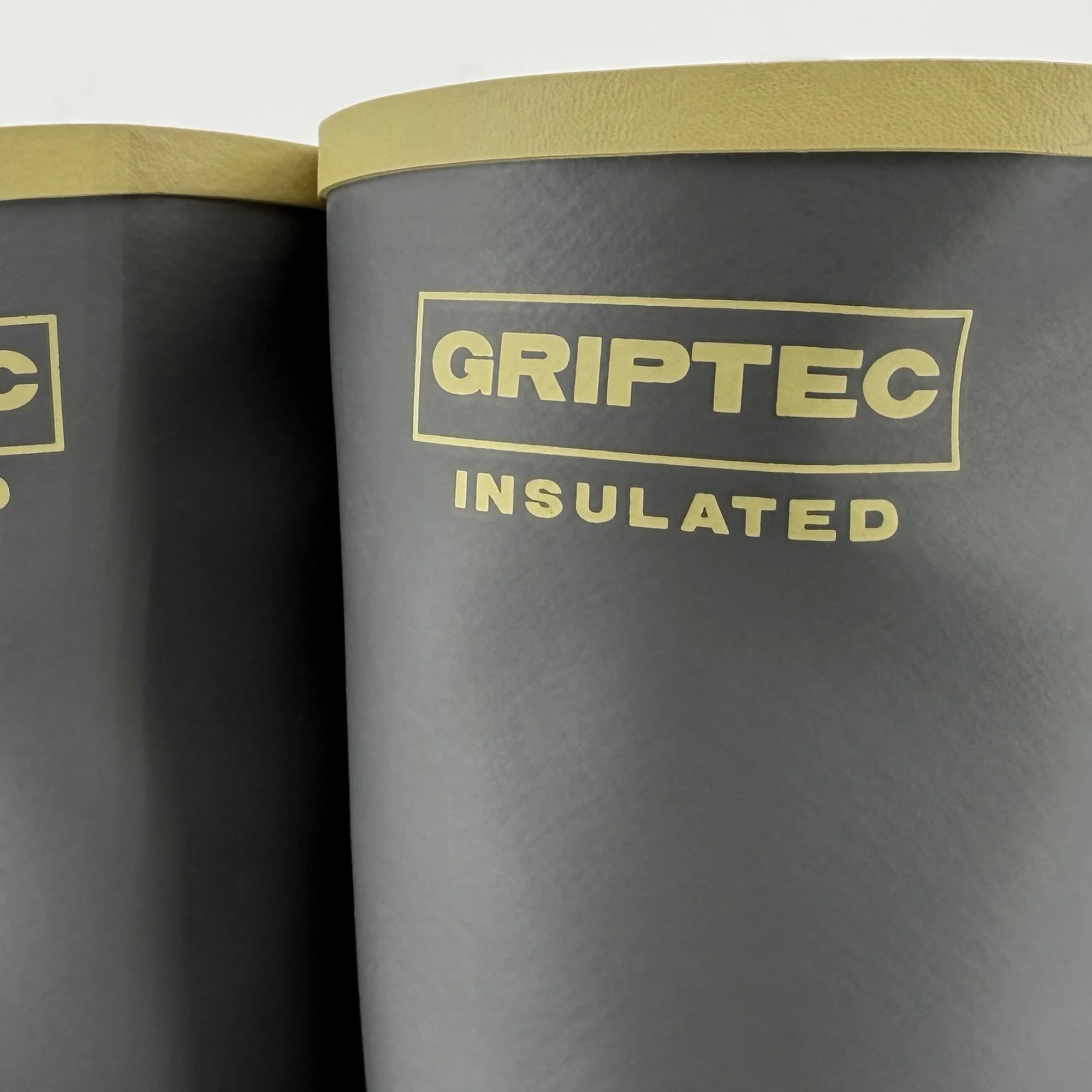 Tahma insulated and Griptec boot branded on the upper half of the 15 inch tall boot