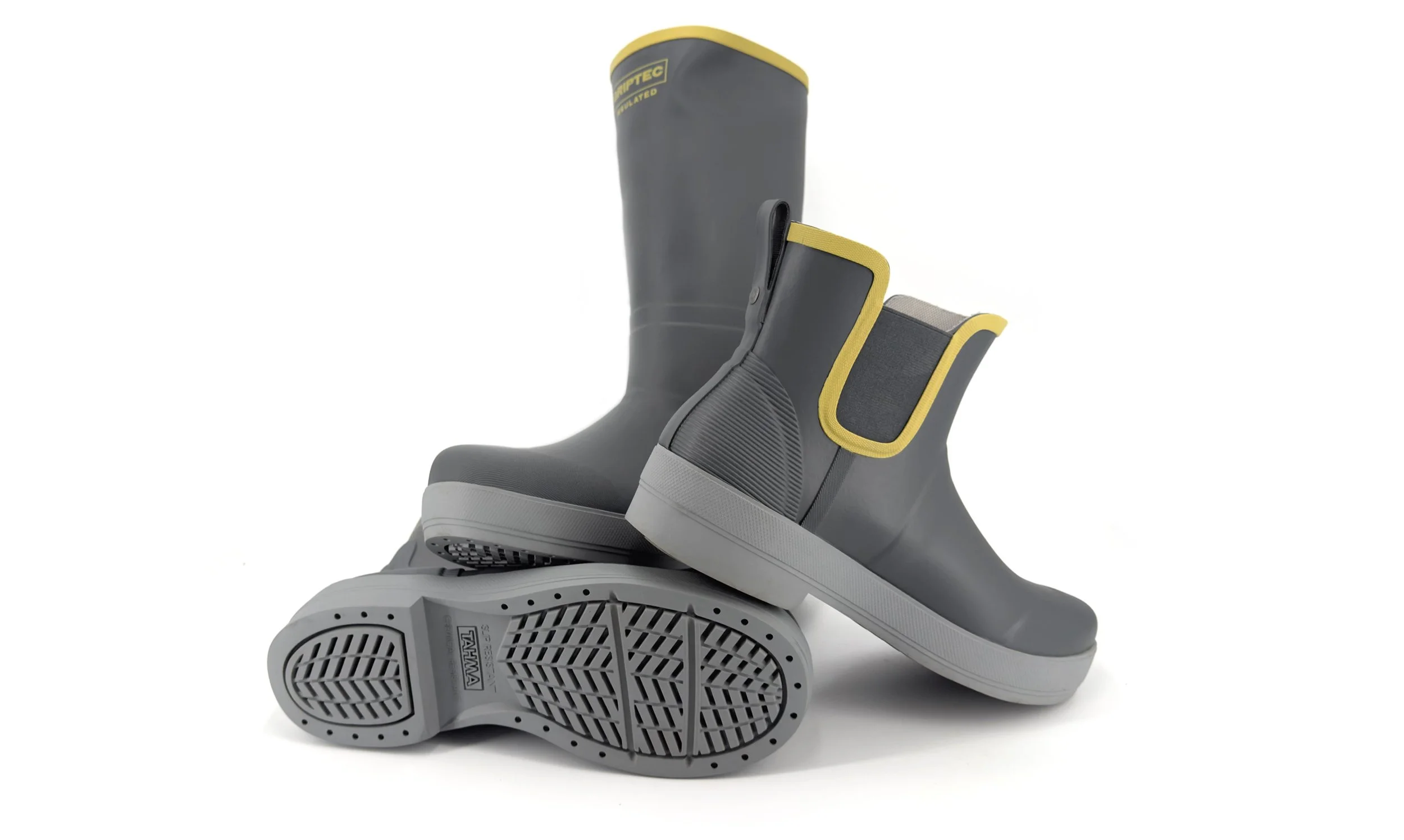 Tahma 15 inch and low-cut 7 inch boots in a pile on a white background