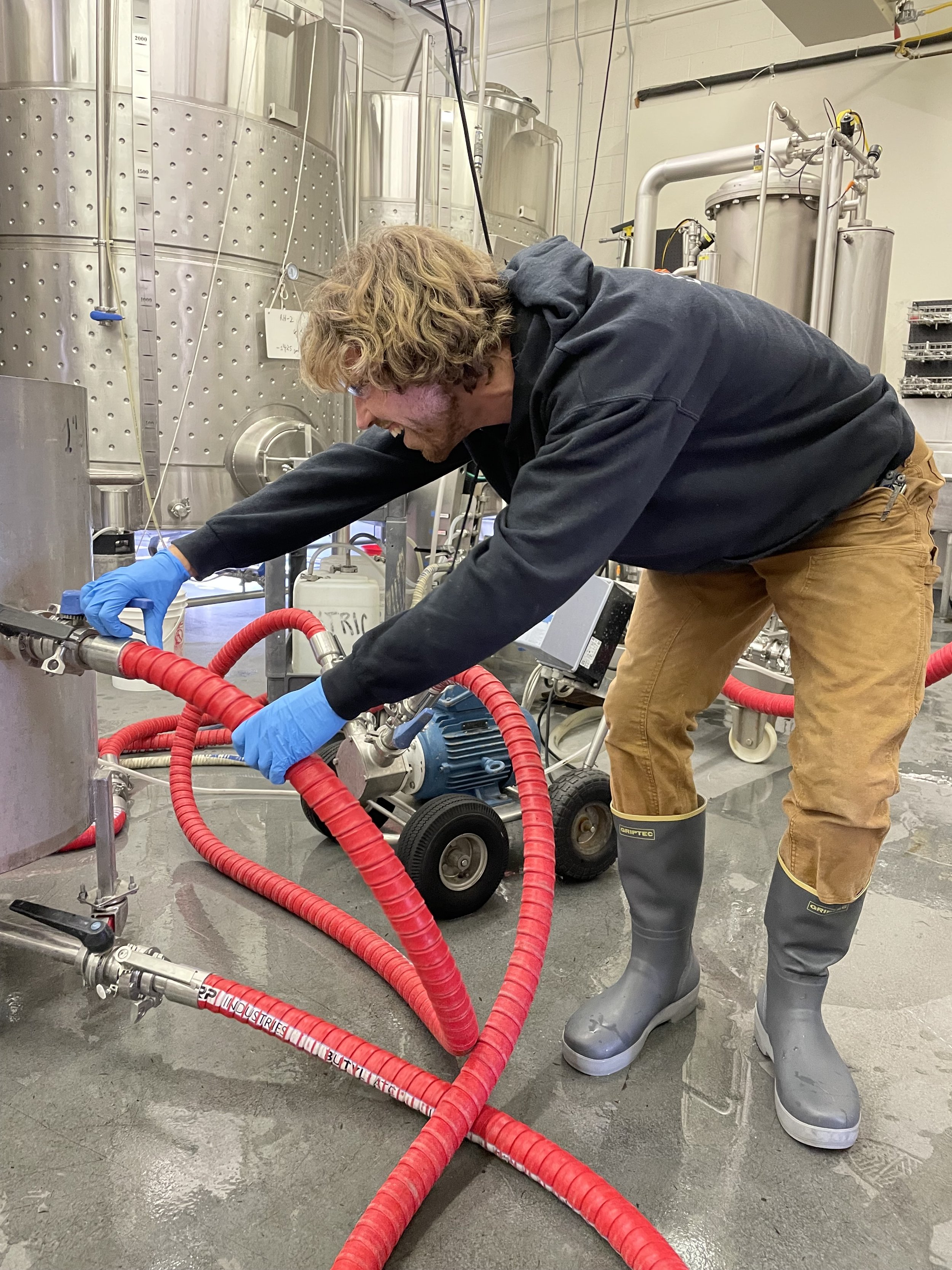 Customer wearing Tahma boots at a micro brewery