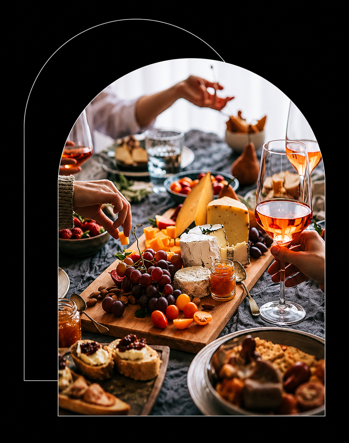 Guests enjoying charcuterie and cocktails by The Drink Lab at a private event.