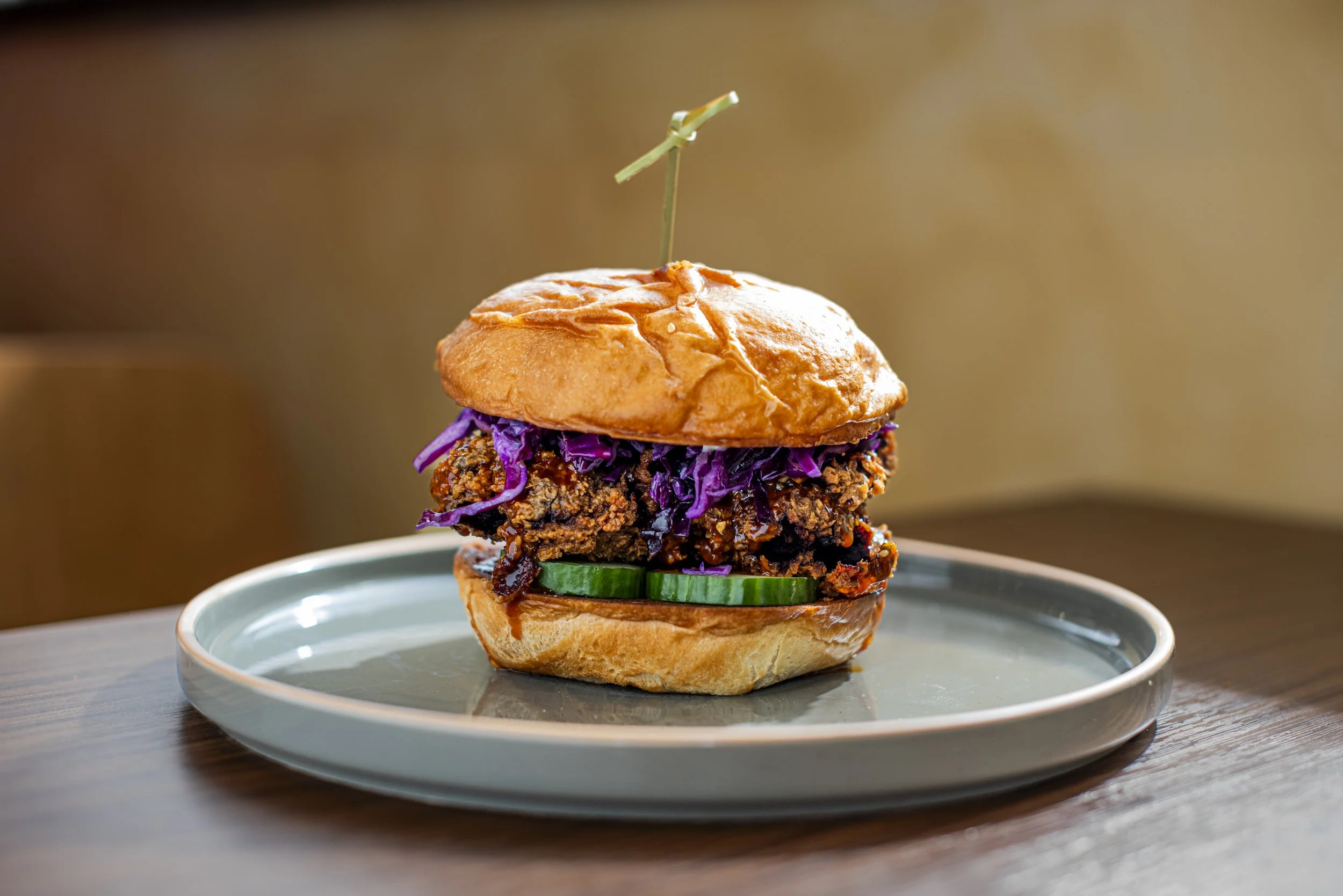 It is a work of art. It is an elevated chicken sandwich experience. It is available at White Lotus Farms Café.