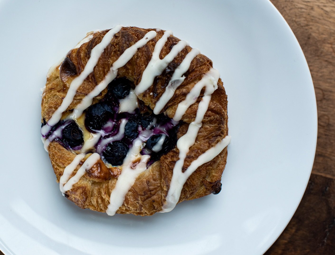 It's 8 am and you've just had a shot of espresso pulled here at White Lotus Farms Cafe. Out of the corner of your eye you catch a glimpse of that still warm from the oven blueberry danish. Now the morning is complete. 