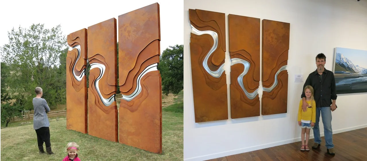 Side-by-side images of a rust-colored abstract wooden art installation. The left image shows it outdoors with a person and a child observing it, and the right image shows it indoors with two people standing in front of it.
