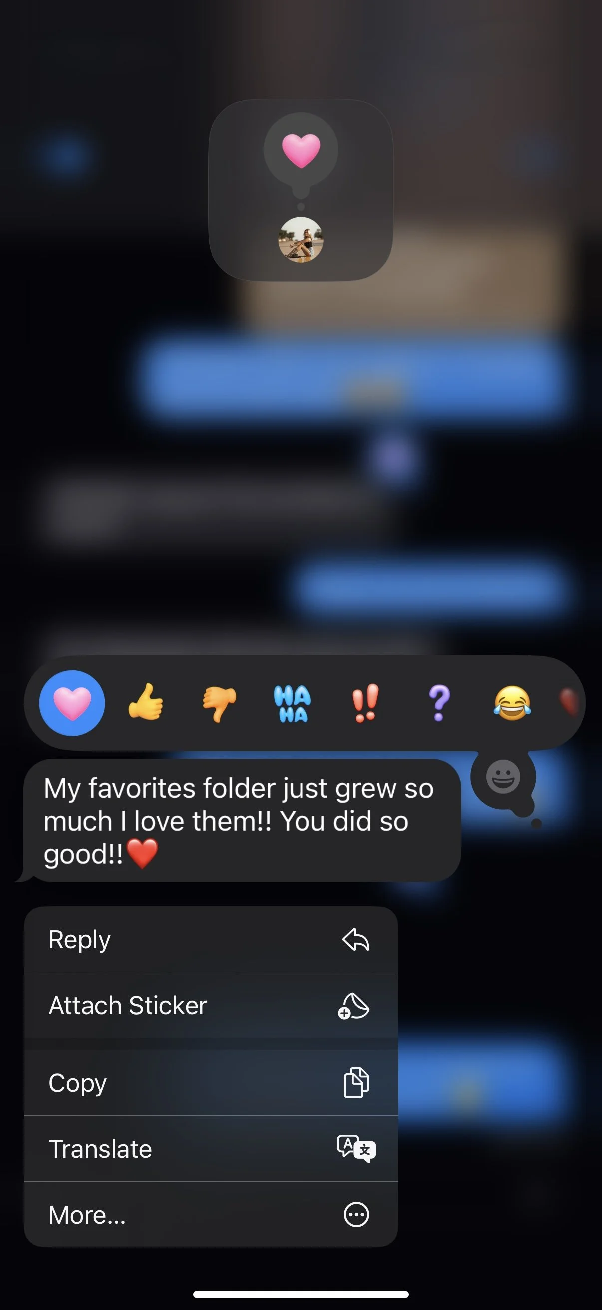 Screenshot of a messaging app showing a conversation with a sticker and a message praising a folder organization, with options to reply, attach a sticker, copy, translate, or more.