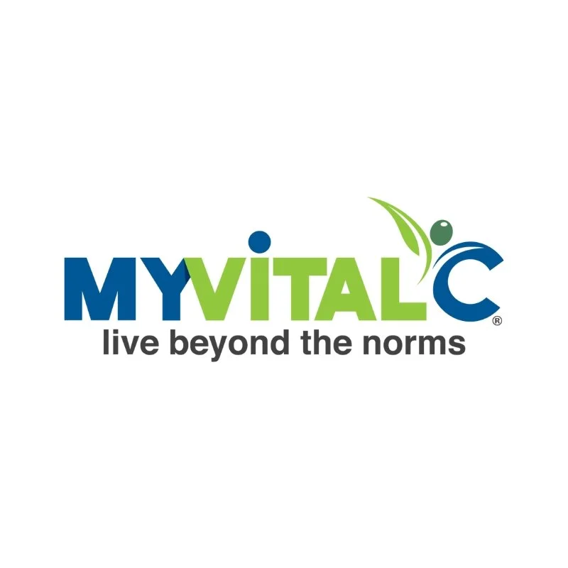 MyVitalc logo with the tagline 'live beyond the norms' beneath it, featuring green and blue text with abstract leaf and wave elements.