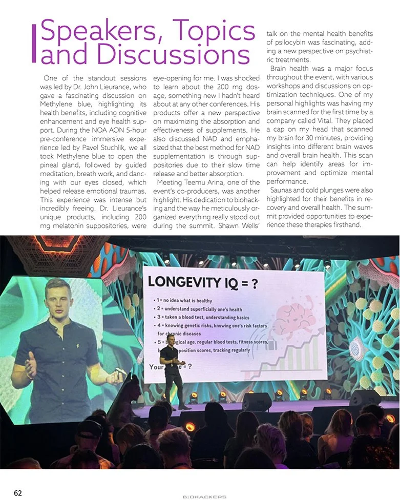 A speaker on stage presenting a slide titled 'LONgevity IQ = ?' at a conference. The slide lists different definitions of health related to longevity and features a mouse with a DNA helix. The audience is seated in front of the stage, and a large scr