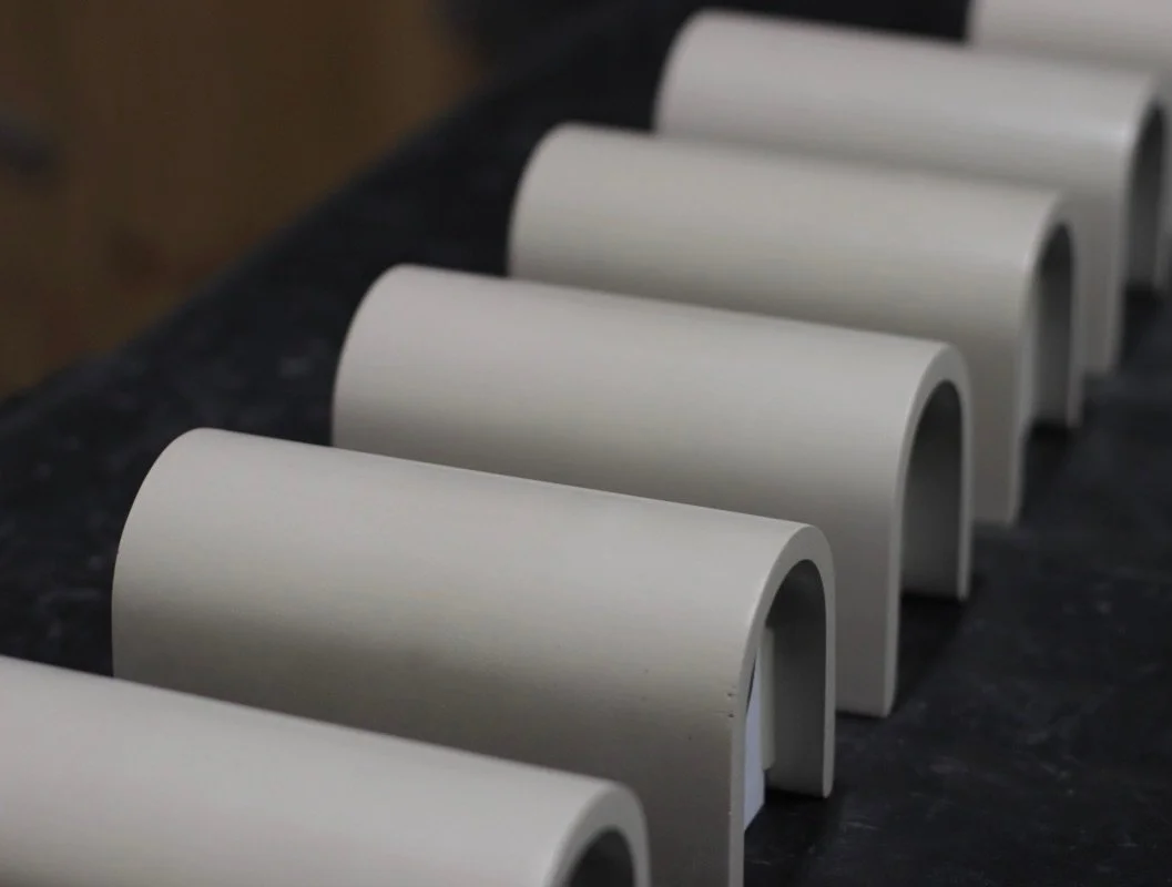 The Arc&eacute; Duo &mdash; lining up for their final checks.
Hand-cast. Hand-finished. No shortcuts.
Light. Cast in stone.