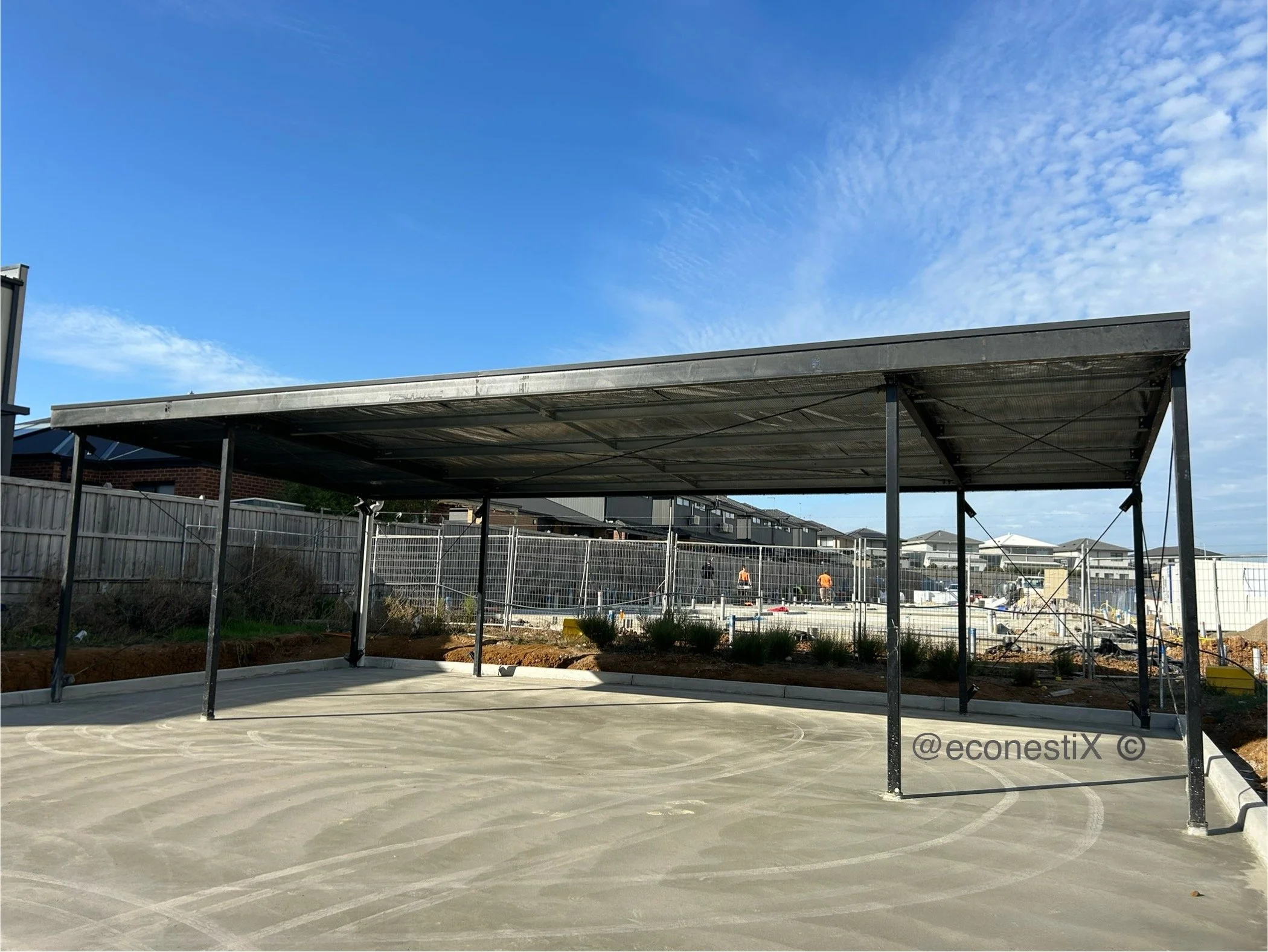 Company carpark with under rooftop space netted to keep out birds. This installation of birdproof netting is diligent foresight by commercial architects and builders in the design and construction phases. Installation before a pest bird problem syant