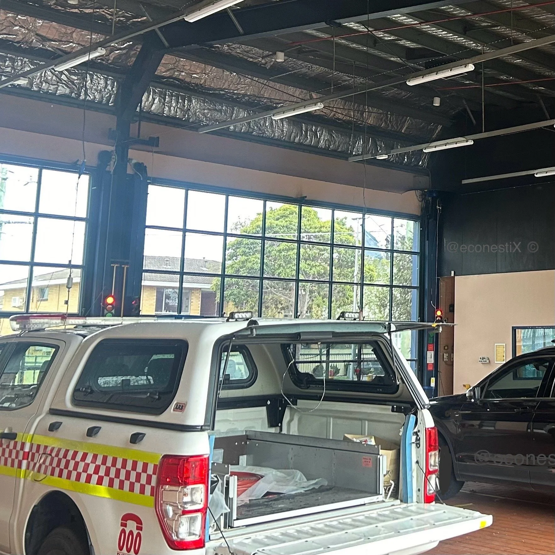 Soffit Ceiling net installed at a fire station to exclude pigeons form accessing the roof sapce a soiling trucks with unhygenic droppings insalled by Alistair from econestix the bird proof experts