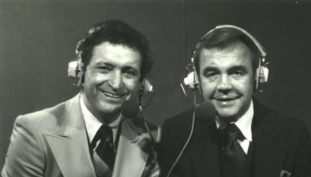 Photo of NBC broadcasters Dick Enberg and Al McGuire