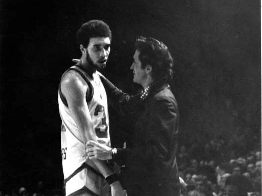 Photo of Marquette player Bo Ellis and Marquette coach Al McGuire
