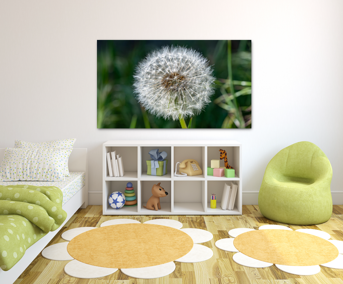 Close-up of water swirling around a rock in a whirlpool with varying shades of teal, blue, and brown.