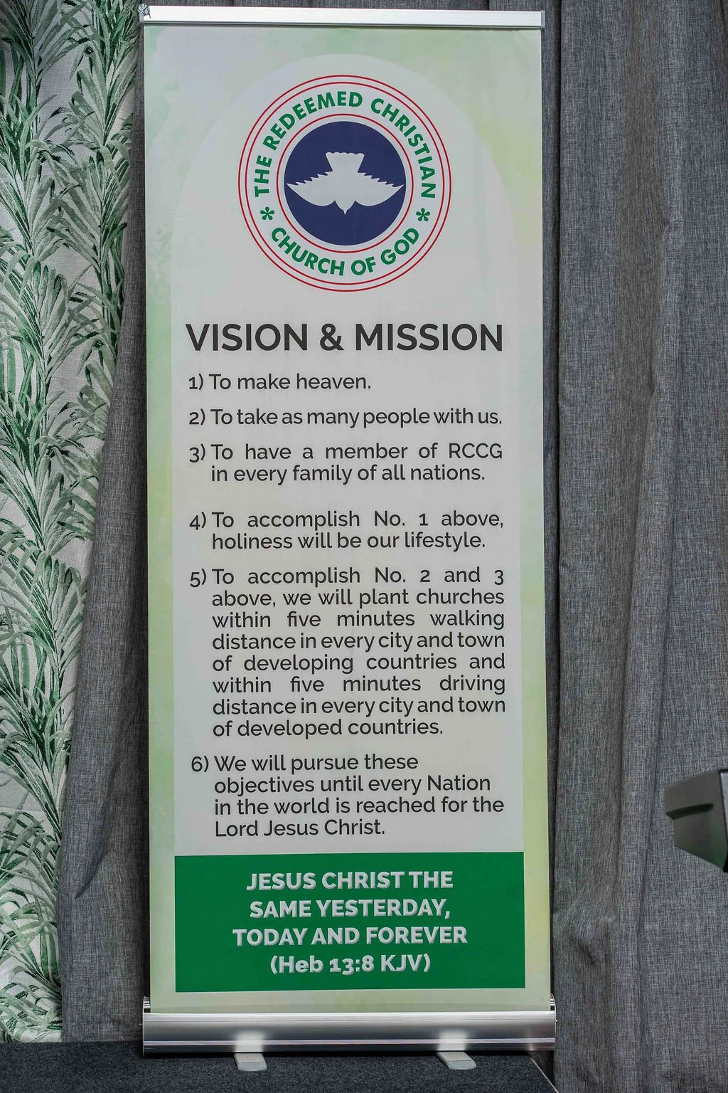 Vision and mission banner for The Redeemed Christian Church of God, featuring the church logo and Christian outreach goals.