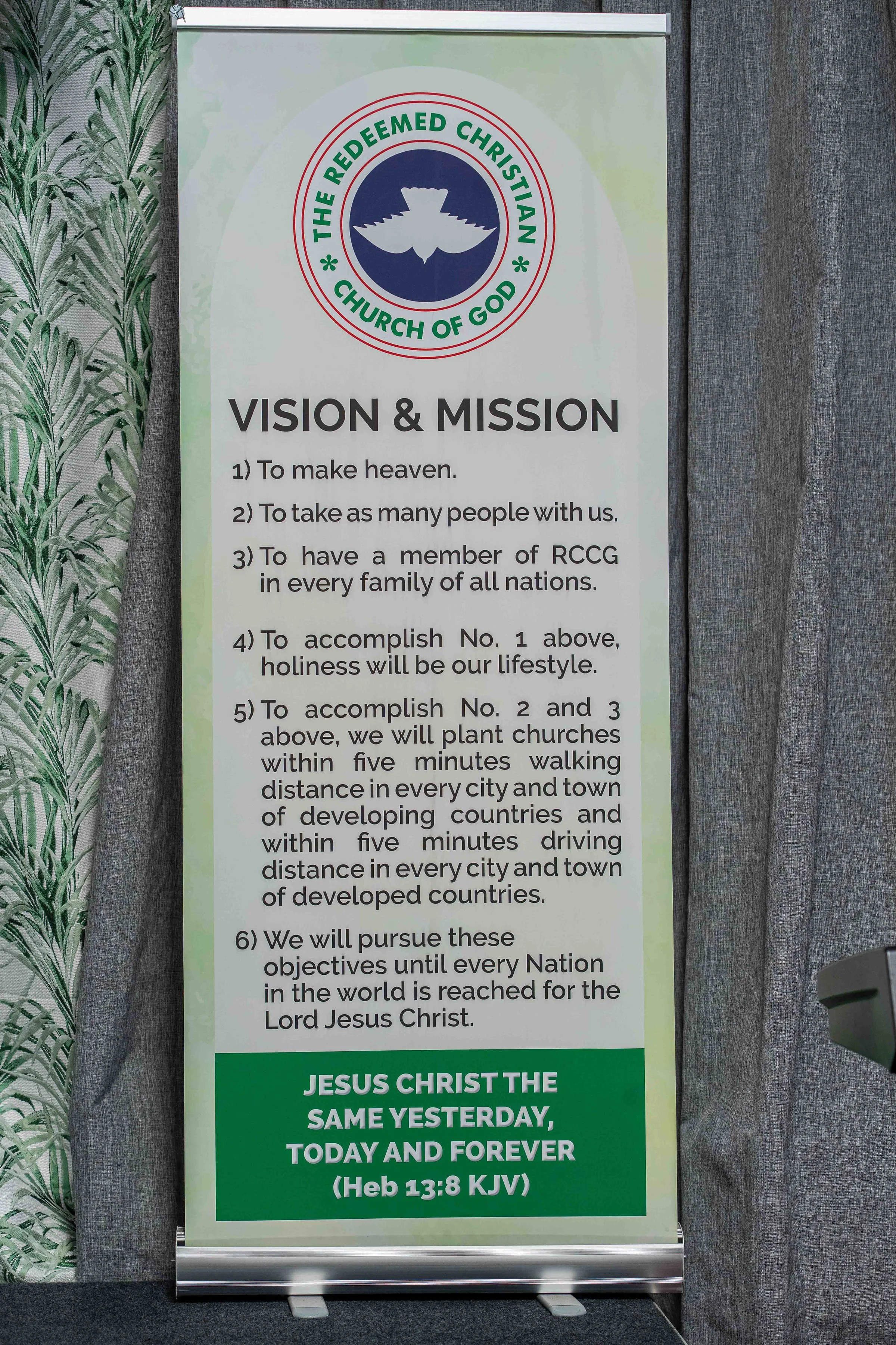Church of God vision and mission banner featuring the Redeemed Christian Church of God logo and Christian mission statements.