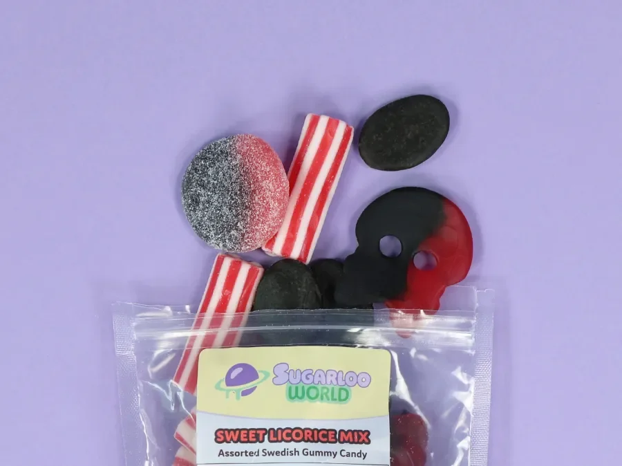 Sugarloo World Sweet Licorice Mix assorted Swedish gummy candy spilling from bag on purple background.