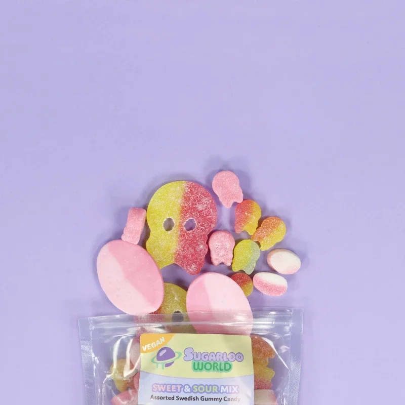 Sugarloo World Sweet & Sour Mix assorted Swedish gummy candy bag with pink, yellow, and sugar-coated gummies spilling out on a purple background.